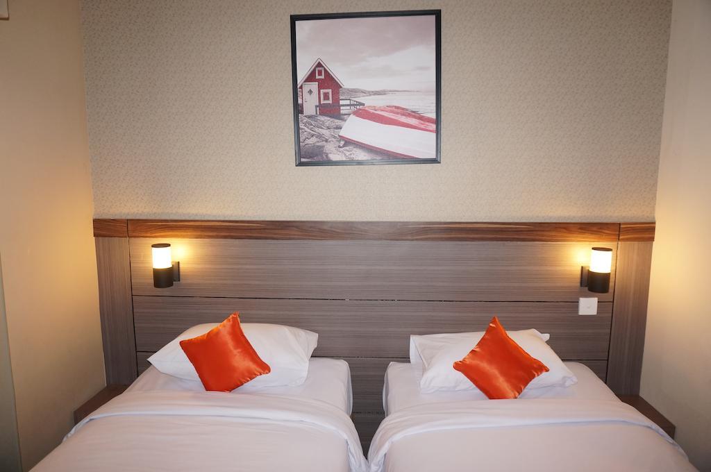 Ekon Hotel Yogyakarta Chambre photo
