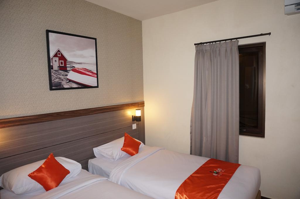 Ekon Hotel Yogyakarta Chambre photo
